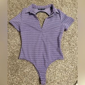 Open back geometric collar bodysuit. Runs small
